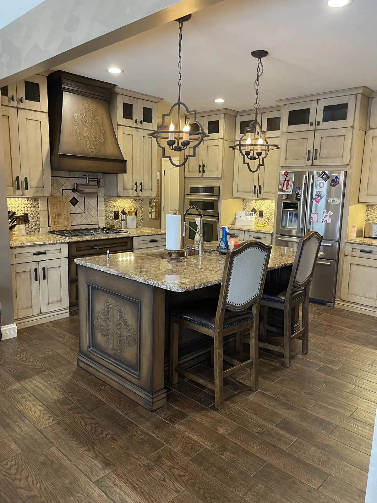 Kitchen with a furniture-style island and pendant lighting